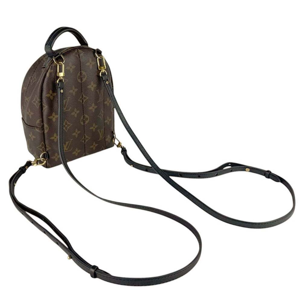 LOUIS VUITTON Brown Monogram Canvas Backpack - Picture 10 of 13